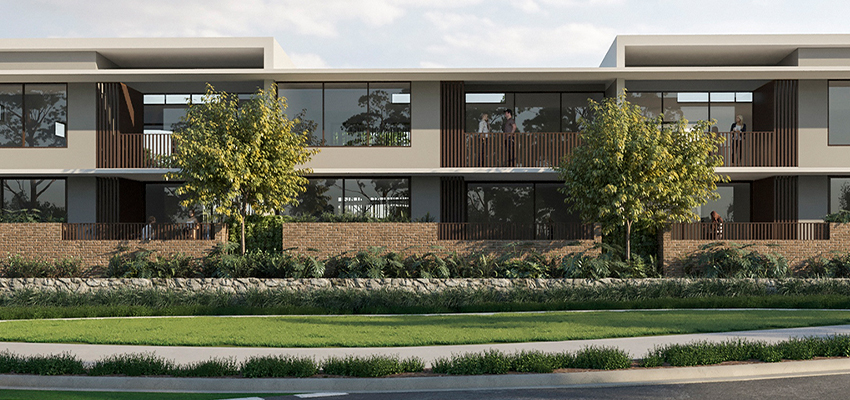 Wide shot of the front of a modern apartment block