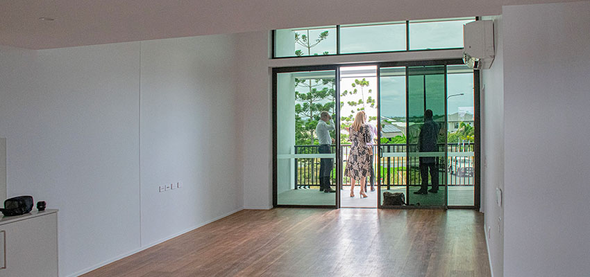 Large, bright living room with sliding doors at the front