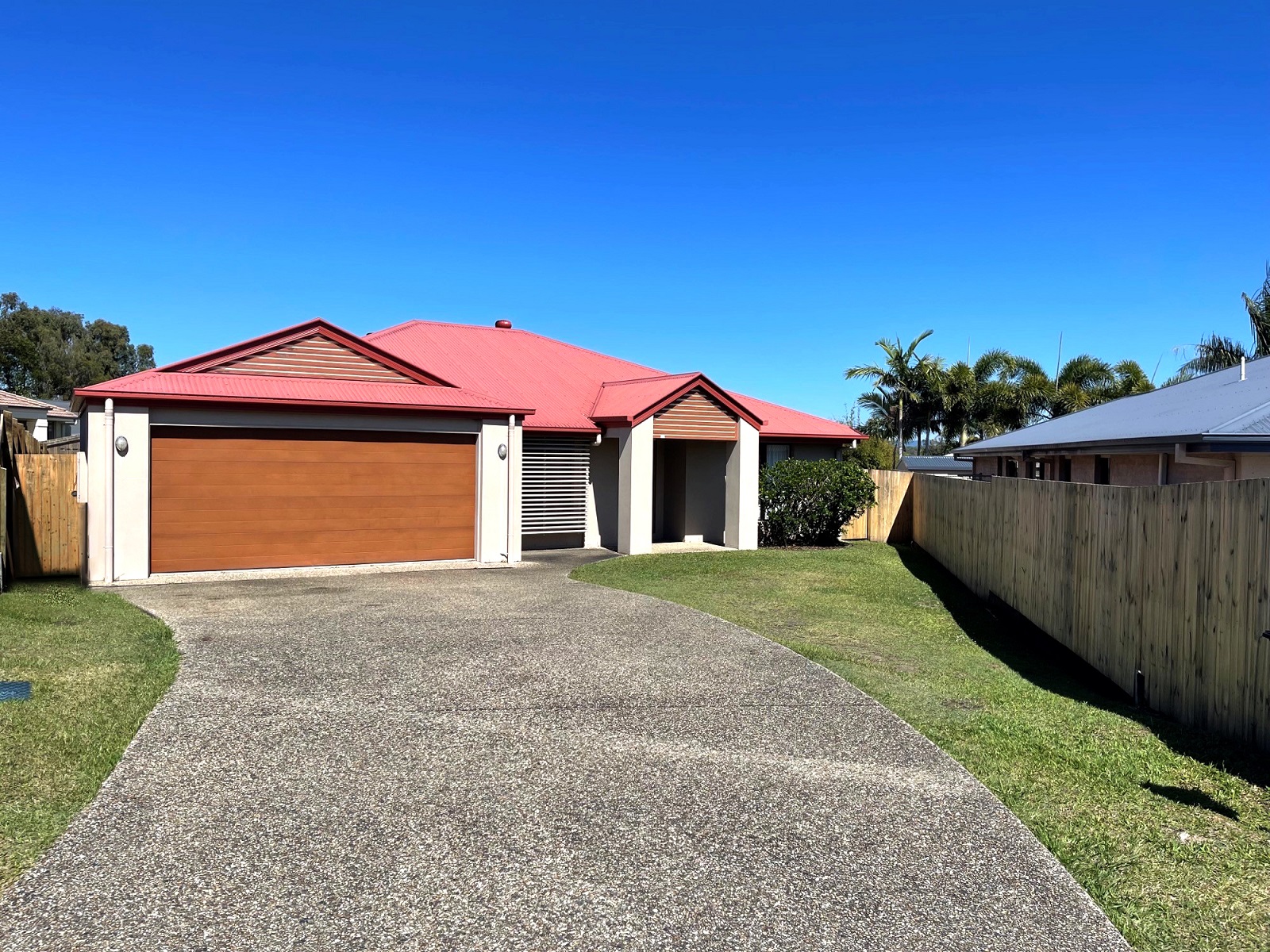 SIL Vacancy in Sunshine Coast showing the front of a low set home and driveway