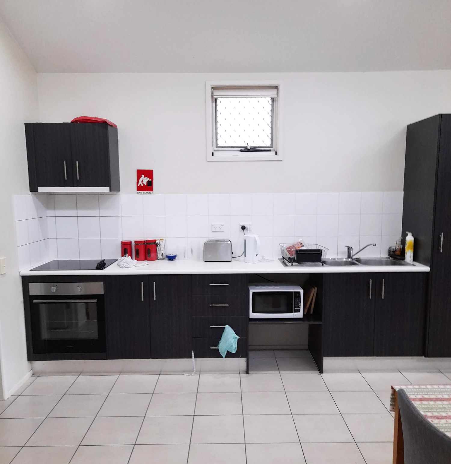 Melissa Street - Kitchen with dark cabinets