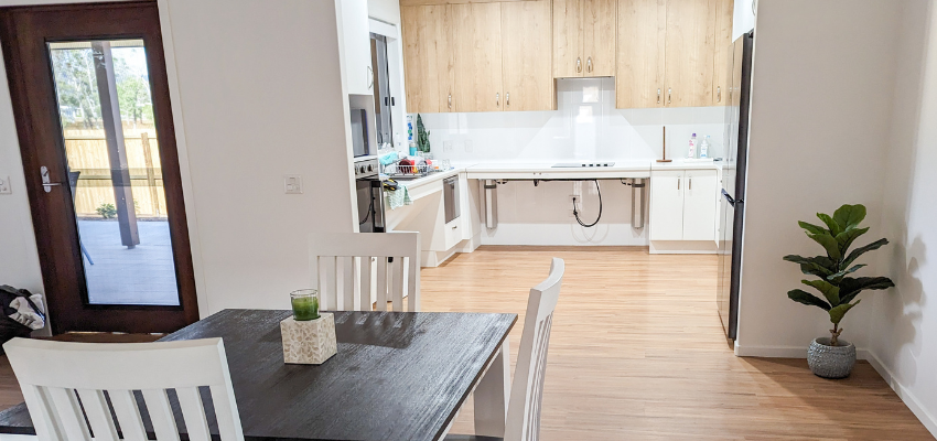 An image of the kitchen from the dining room