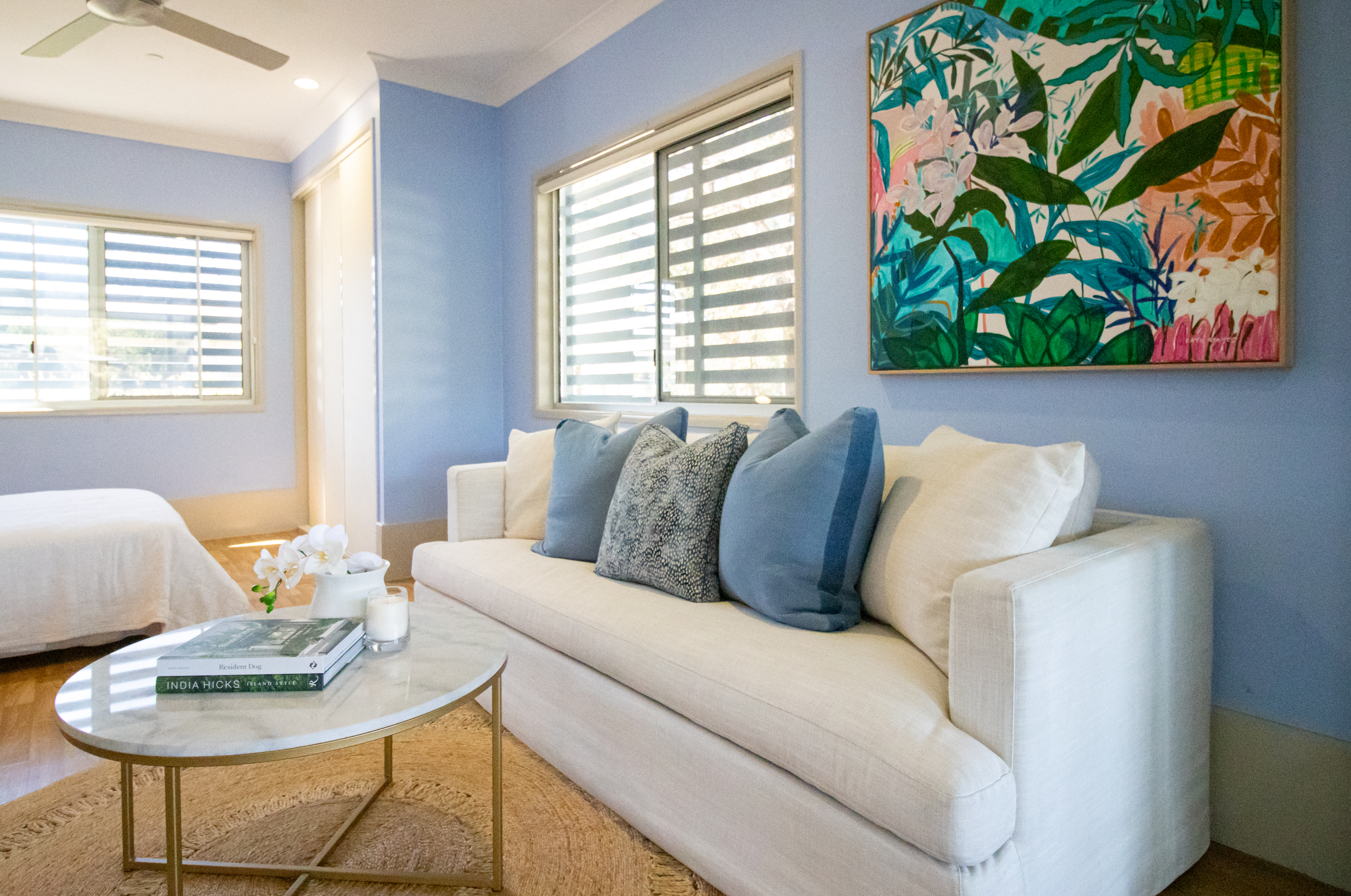 Lounge room with a beige couch and coffee table