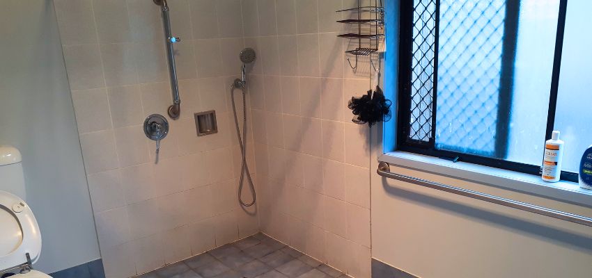 Bathroom with a wet room shower