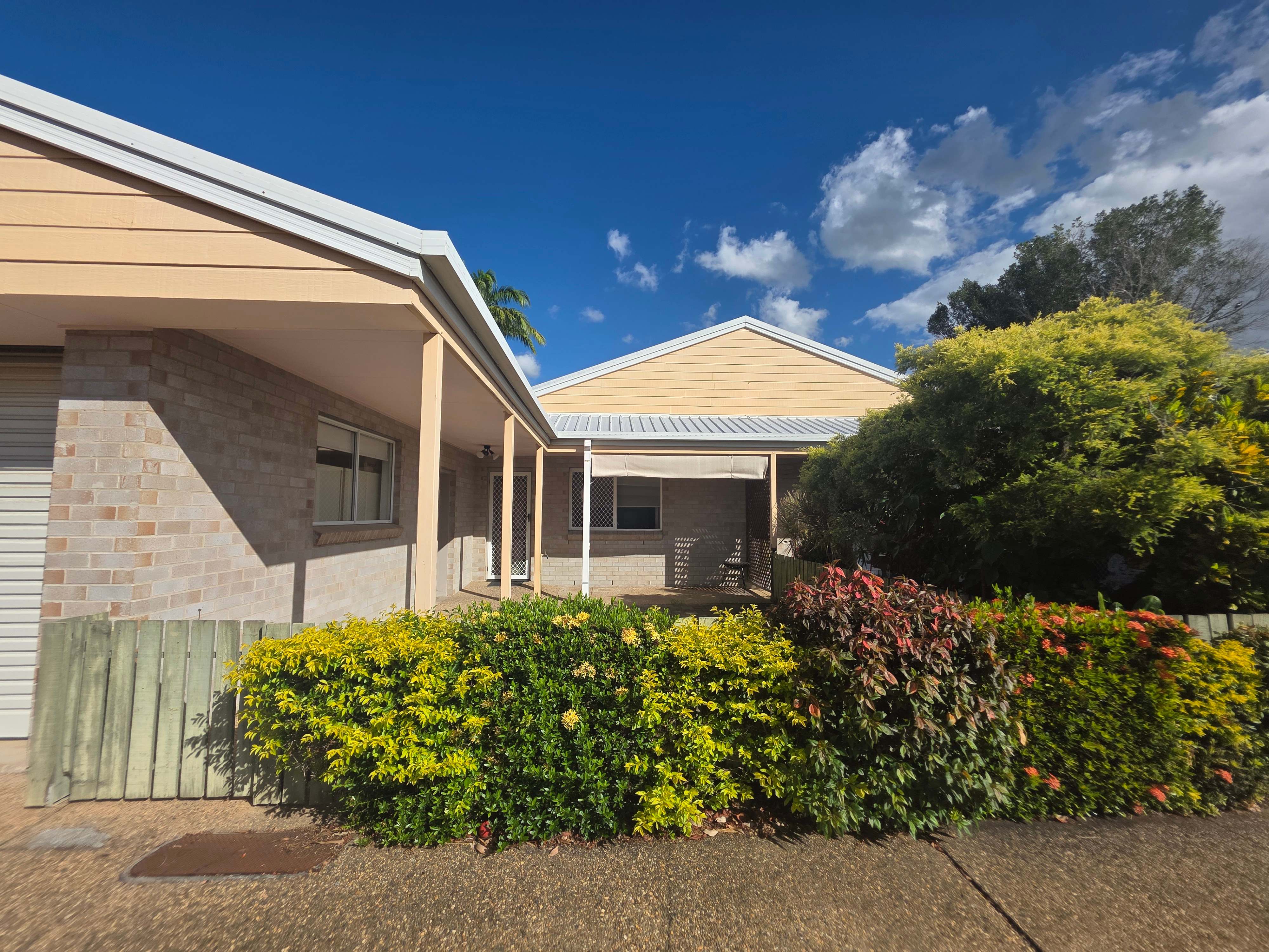 An image showing the front of the property with the garden visible