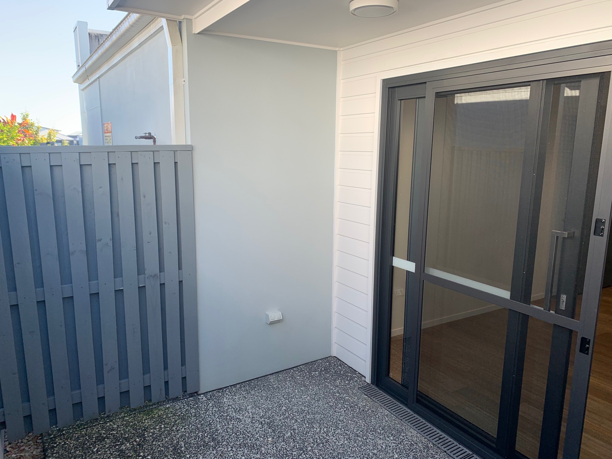 Third view of the patio with the bedroom door closed