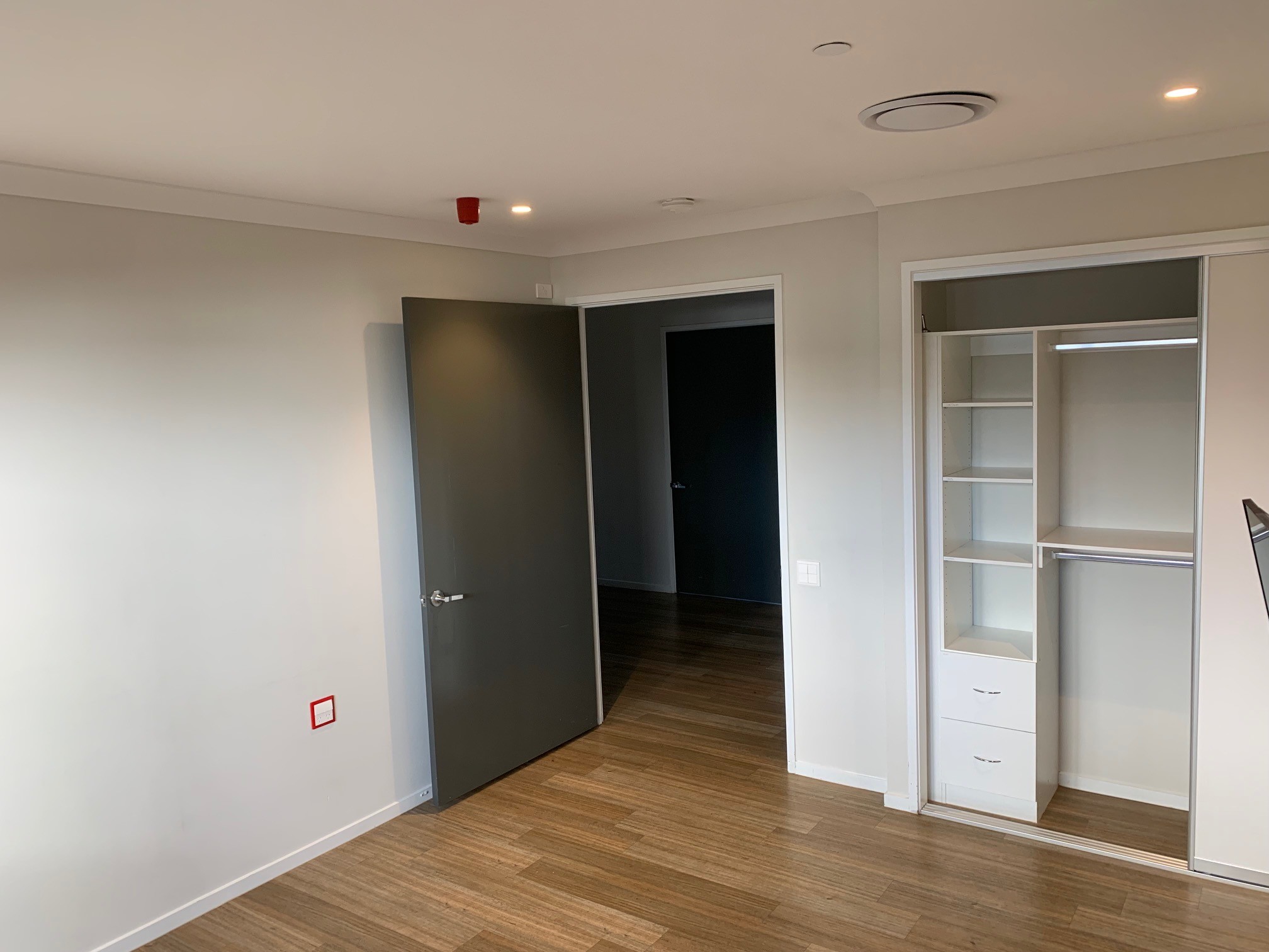 An image showing doorway of the bedroom