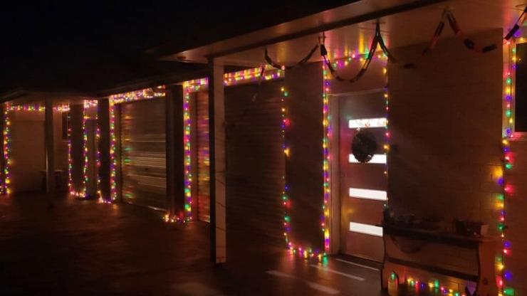 Houses with fairy lights on the outside