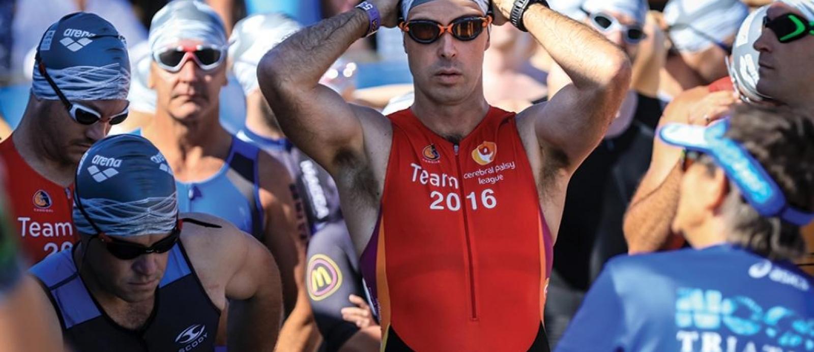 Man prepares to swim as part of a challenge event to support CPL