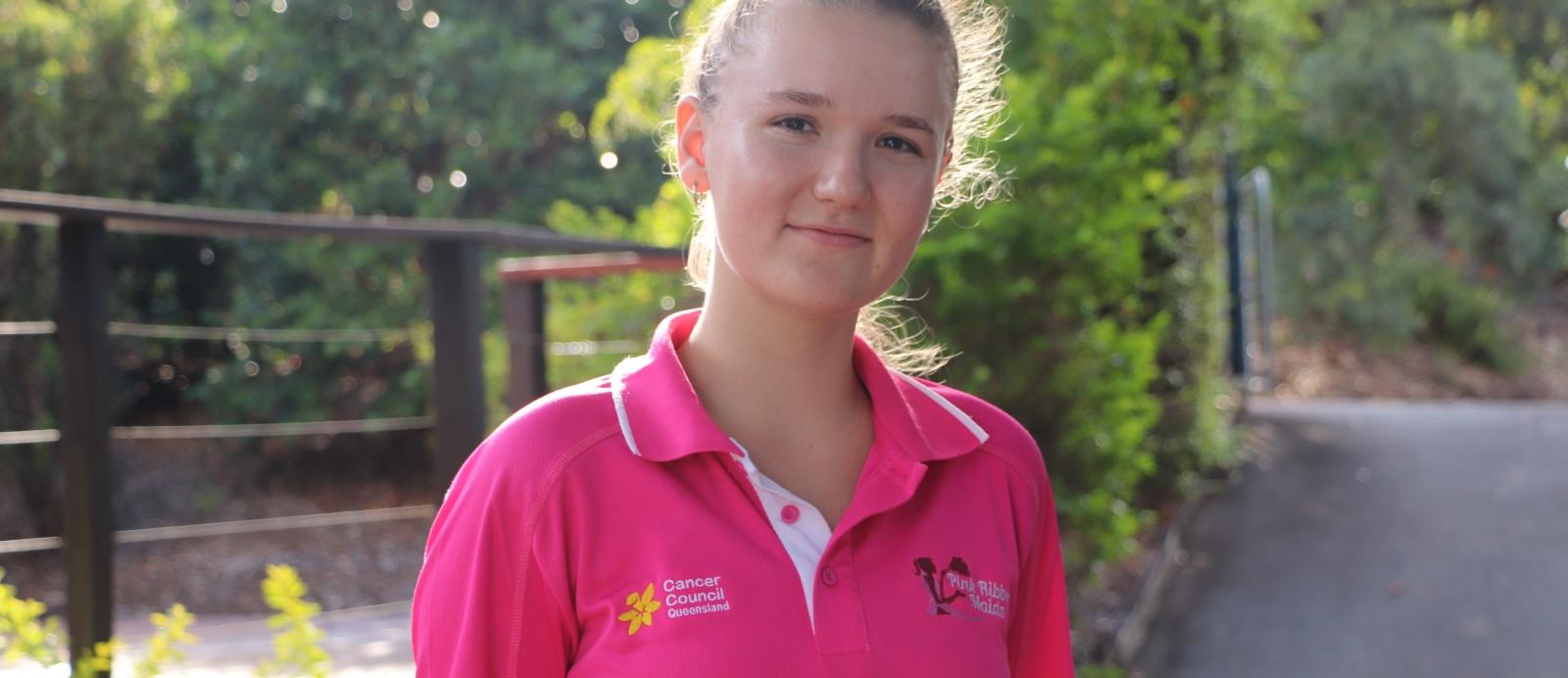 Young woman smiles at camera